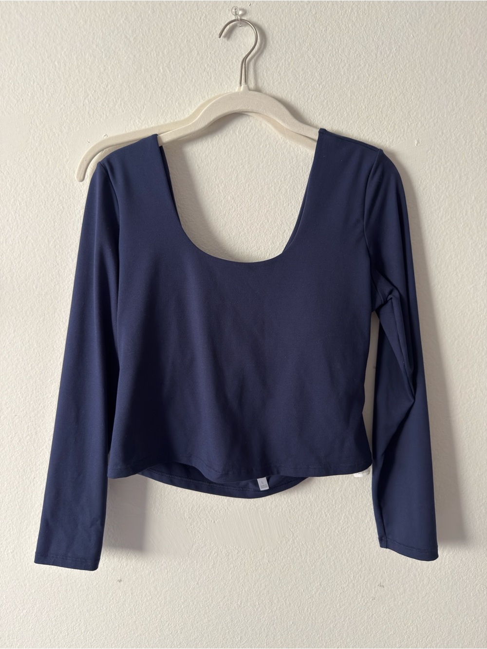 Navy Scoop Neck Long-Sleeve Crop Top w/ Twist in the back.